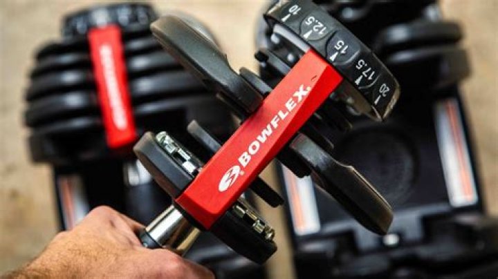 How do you use Powerblock adjustable dumbbells?