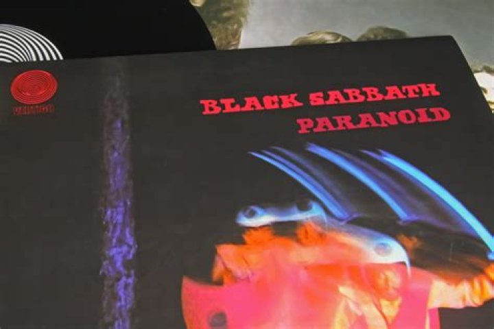 What is on the cover of Paranoid album?